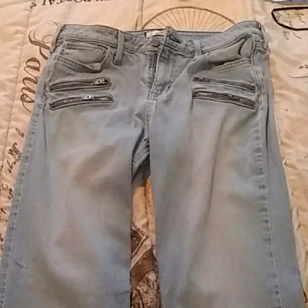 Blue jeans with a zipper in the front